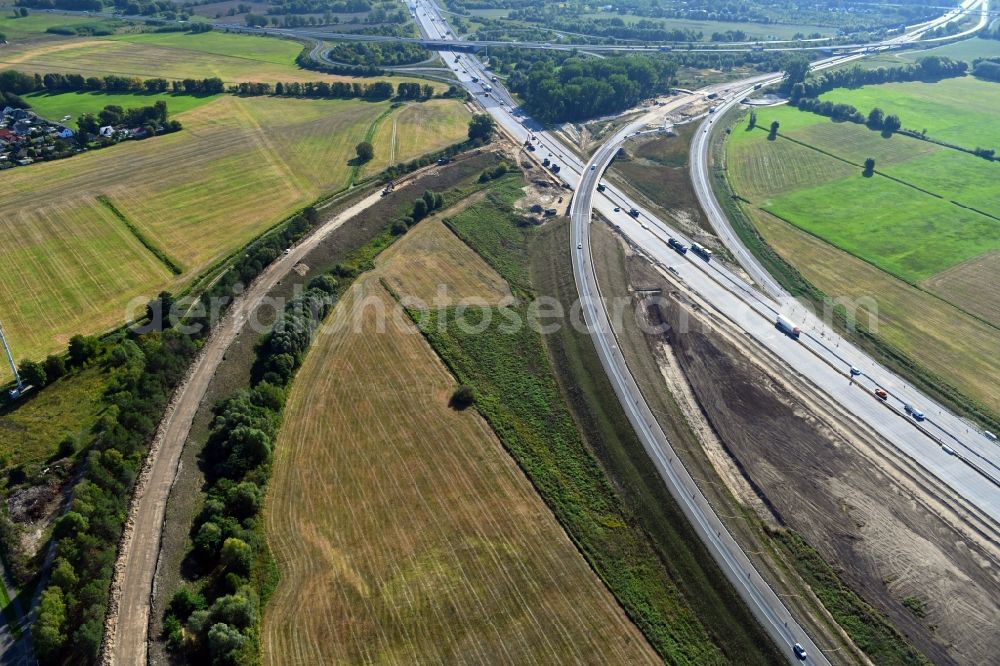 Leegebruch from the bird's eye view: Construction to extend the traffic flow at the intersection- motorway A 10 - A110 a?? Kreuz Oranienburg a?? in Leegebruch in the state Brandenburg, Germany