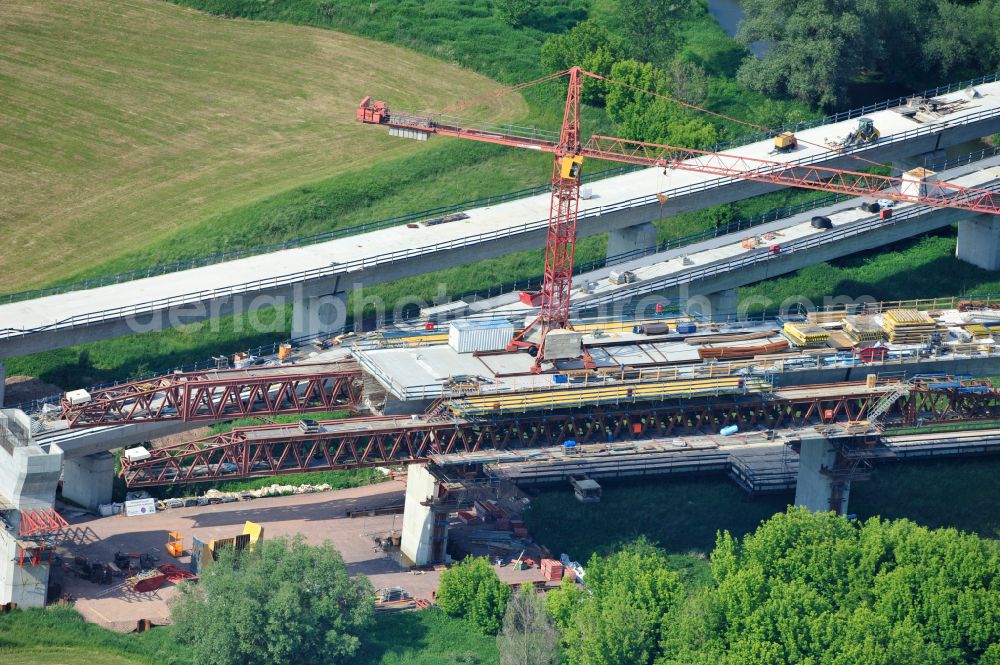 Rattmannsdorf from the bird's eye view: Construction site of viaduct of the railway bridge structure to route the railway tracks in Rattmannsdorf in the state Saxony-Anhalt, Germany