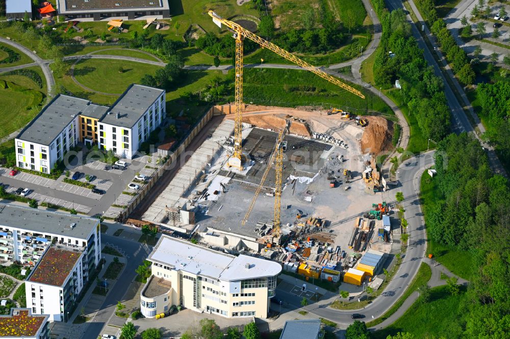 Aerial image Coburg - Construction site for the new construction of the building complex of a residential complex with an integrated local supply center auf of Bertelsdorfer Hoehe on street Max-Boehme-Ring in the district Ketschendorf in Coburg in the state Bavaria, Germany
