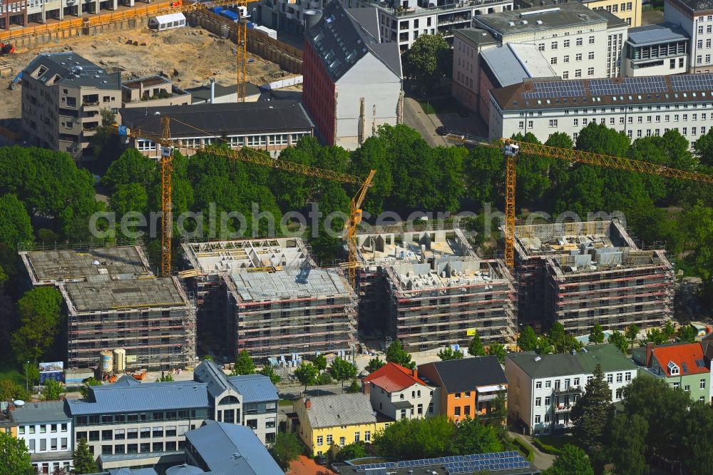 Rostock from the bird's eye view: Construction site to build a new multi-family residential complex Am Rosengarten on August-Bebel-Strasse - Wallstrasse in the district Stadtmitte in Rostock in the state Mecklenburg - Western Pomerania, Germany