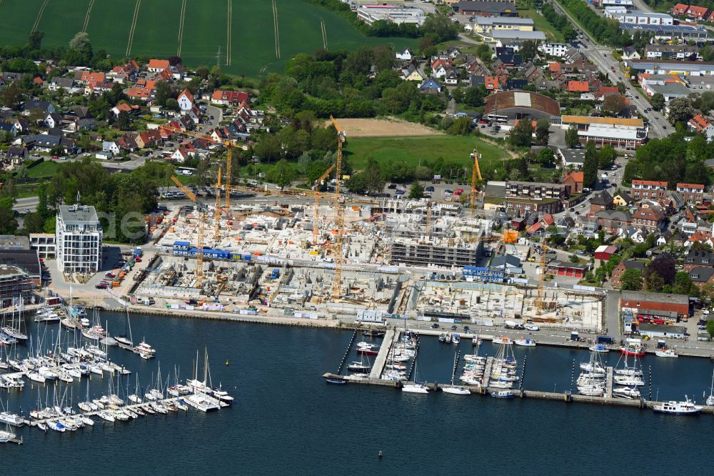 Travemünde from the bird's eye view: Residential construction site with multi-family housing development- on the Auf dem Baggersand in Travemuende in the state Schleswig-Holstein, Germany