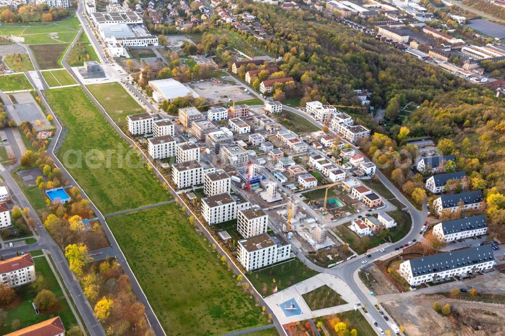 Würzburg from above - Residential construction site with multi-family housing development- on the along the Norbert-Glanzberg-strasse in Wuerzburg in the state Bavaria, Germany Two larger buildings were built by the construction community Wuerzburg GbR and planned for the companies bogevischs buero architekten & stadtplaner GmbH and bauart Konstruktions GmbH + Co. KG, and more of the INDUSTRIA WOHNEN GmbH are to be built here