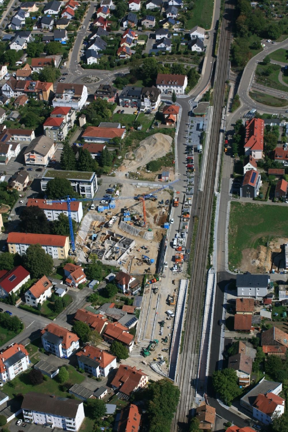Grenzach-Wyhlen from the bird's eye view: Residential construction site with multi-family housing development- on the Gartenstrasse in Grenzach-Wyhlen in the state Baden-Wurttemberg, Germany