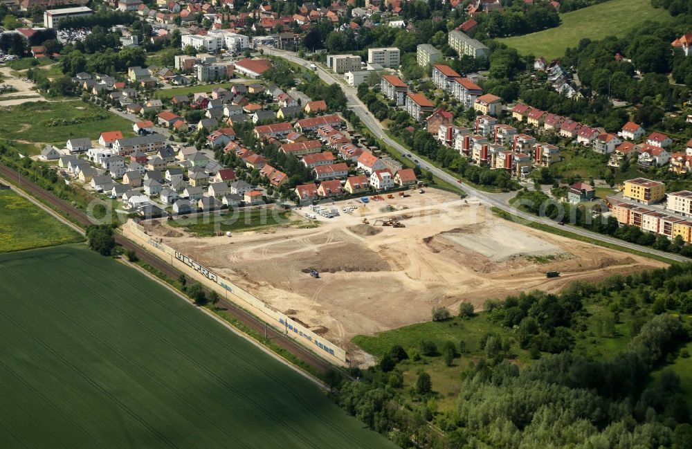 Jena from the bird's eye view: Residential construction site with multi-family housing development- Am Oelste on Leibnizstrasse between the local rail course and B88 in the district Zwaetzen in Jena in the state Thuringia, Germany