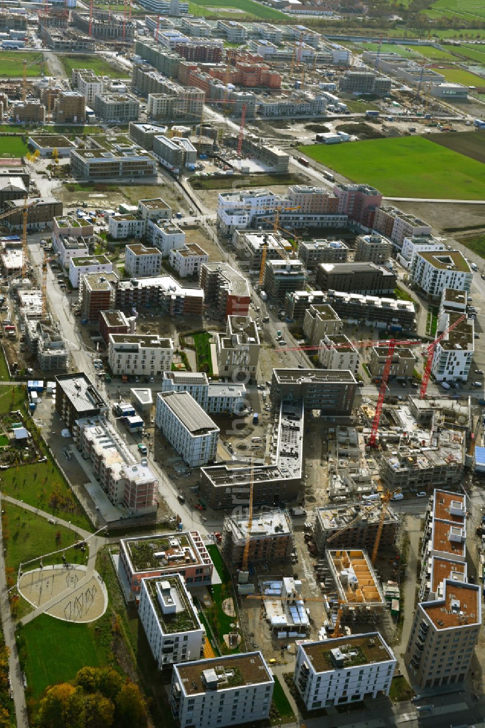 München from above - Residential construction site with multi-family housing development- on street Christel-Sembach-Krone-Strasse - Otto-Meitinger-Strasse in the district Freiham in Munich in the state Bavaria, Germany