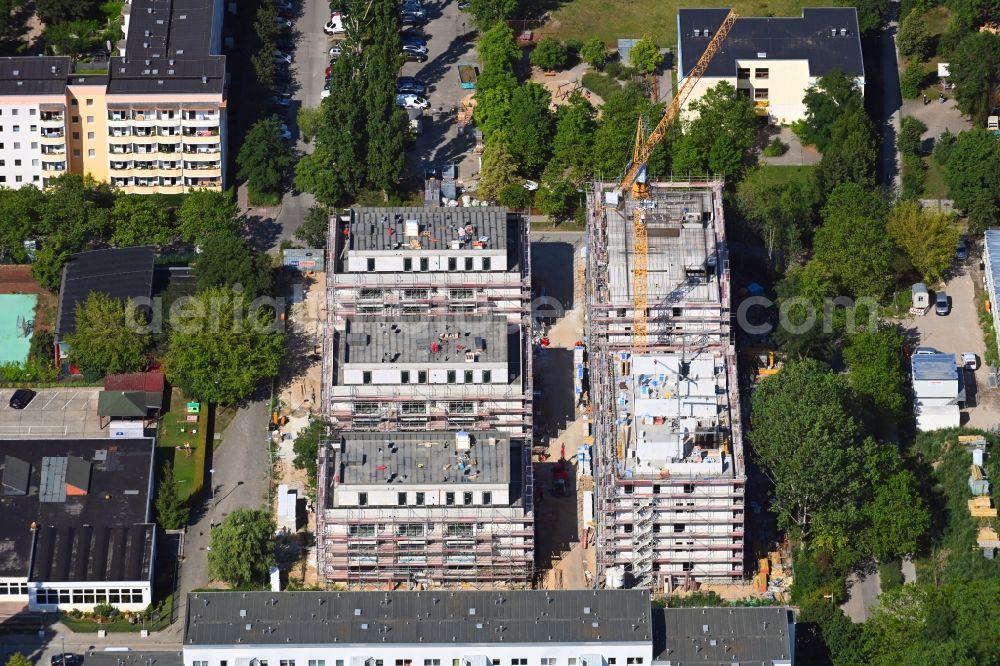 Berlin from the bird's eye view: Residential construction site with multi-family housing development- on the Havellaender Ring corner Zossener Strasse in the district Hellersdorf in Berlin, Germany