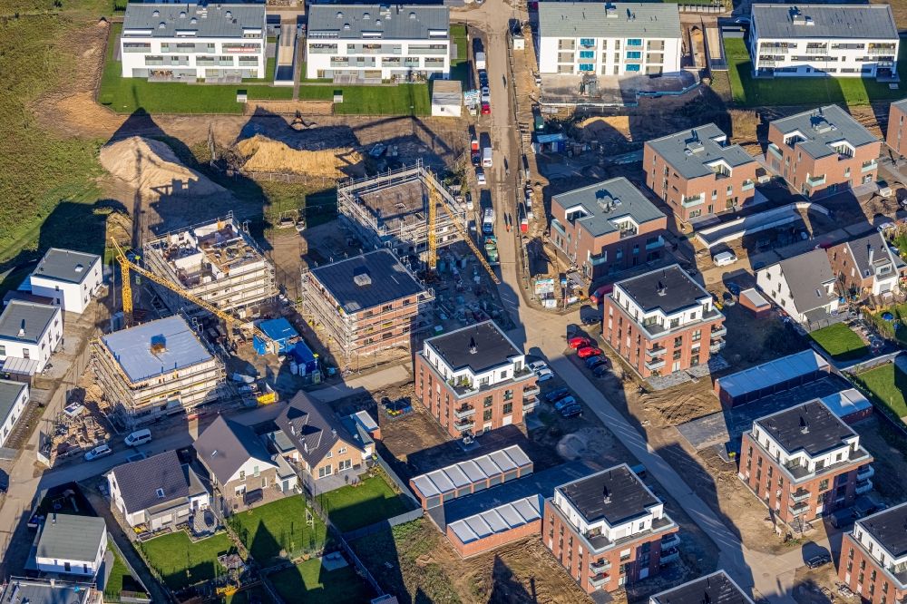 Kamp-Lintfort from above - Residential construction site with multi-family housing development- on the Hardehausen-Strasse - Marienhave-Strasse - Walkenried-Strasse in the district Niersenbruch in Kamp-Lintfort in the state North Rhine-Westphalia, Germany
