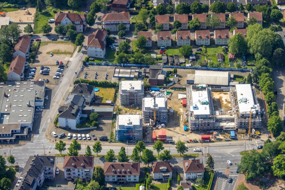 Gladbeck from the bird's eye view: Residential construction site for the construction of a multi-family house settlement and retirement home SCHOeNES LEBEN Gladbeck on Wilhelmstrasse in Gladbeck in the Ruhr area in the state of North Rhine-Westphalia, Germany