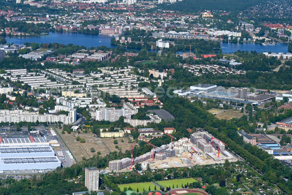 Berlin from the bird's eye view: Residential construction site with multi-family housing development- Seed on the Saatwinkler Damm in the district Siemensstadt in Berlin, Germany