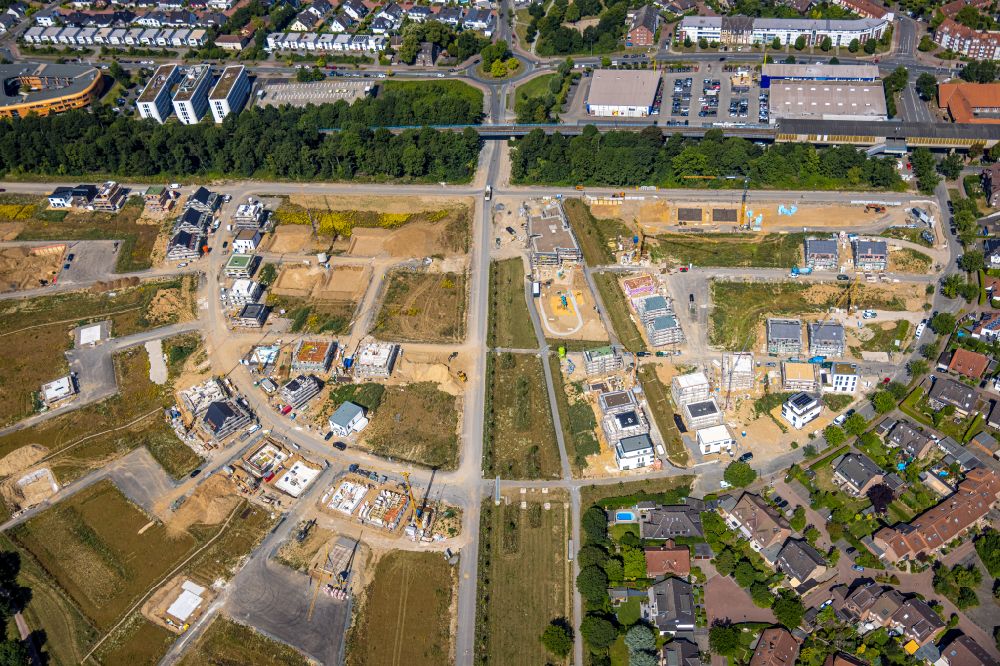 Aerial photograph Duisburg - Residential area construction site of a mixed development with multi-family houses and single-family houses- New building at the Am Alten Angerbach in the district Huckingen in Duisburg at Ruhrgebiet in the state North Rhine-Westphalia, Germany