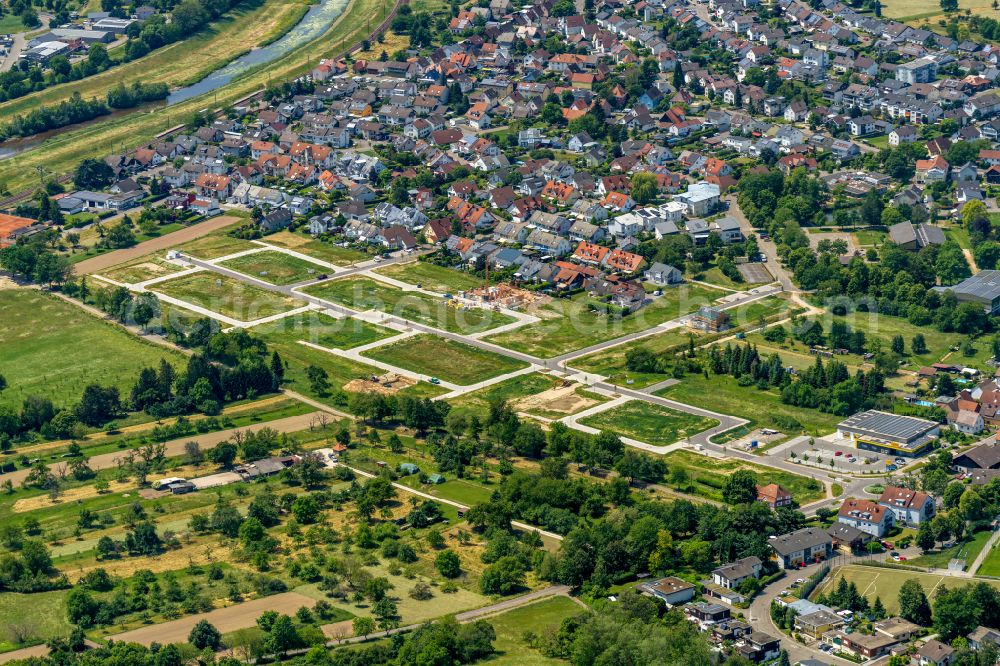 Aerial photograph Bischweier - Residential area construction site of a mixed development with multi-family houses and single-family houses- New building at the on street Zum Markt in Bischweier in the state Baden-Wuerttemberg, Germany