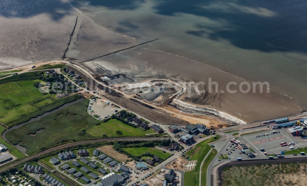Aerial image Dagebüll - Construction site for the new construction of the dyke protection strip Klimadeich on Dagebueller Koog on the street Am Badedeich in Dagebuell North Friesland in the state Schleswig-Holstein, Germany