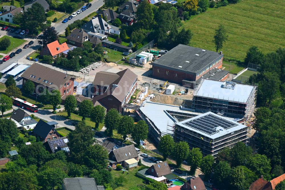 Aerial image Meldorf - Construction site for the extension of the school building of the Gemeinschaftsschule Meldorf on the street Weiderbaum in Meldorf in the state Schleswig-Holstein, Germany