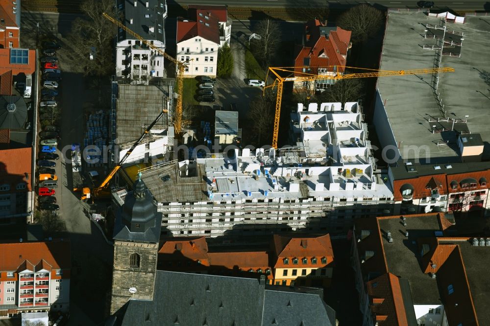 Gotha from the bird's eye view: Construction site for the new construction of an age-appropriate residential park between Margaretenstrasse, Gerbergasse, Gartenstrasse and City-Parkhaus in Gotha in the state Thuringia, Germany