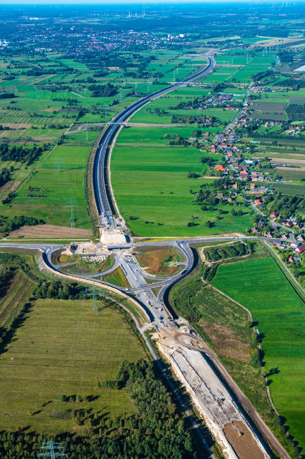 Aerial photograph Neu Wulmstorf - Construction site for new construction on the motorway route of the motorway exit A26 in Neu Wulmstorf in the state of Lower Saxony, Germany