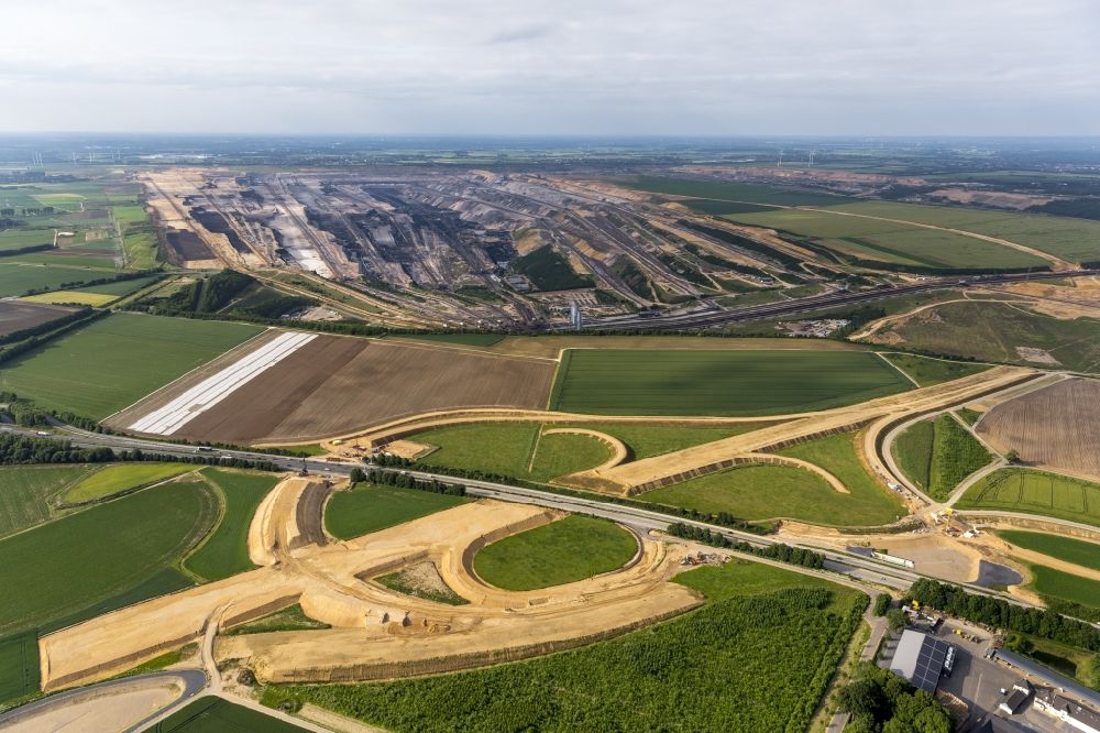 Aerial photograph Bedburg - View of Construction site to build new motorway junction A61 and A44 on lignite mining Garzweiler I Bedburg in the state of North Rhine-Westphalia
