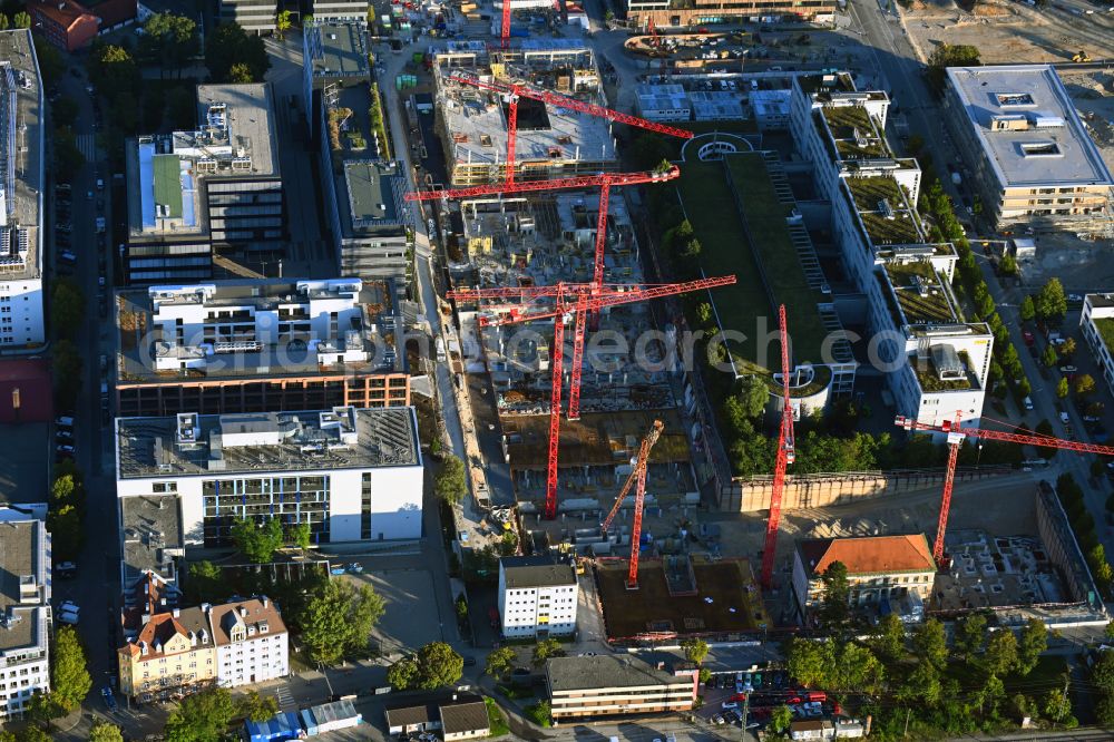 München from the bird's eye view: Construction site for the new building of an Office building - Ensemble of iCampus Rhenania on Friedenstrasse corner Muehldorfstrasse in the district Berg am Laim in Munich in the state Bavaria, Germany