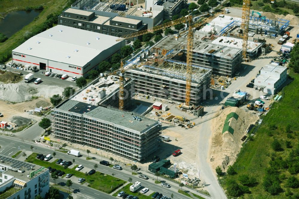 Aerial image Schönefeld - Construction site for the new building of an office building - ensemble on Mizarstrasse in Schoenefeld in the state Brandenburg, Germany