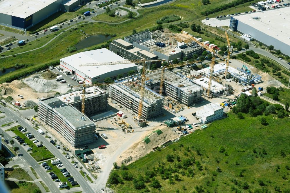 Aerial photograph Schönefeld - Construction site for the new building of an office building - ensemble on Mizarstrasse in Schoenefeld in the state Brandenburg, Germany