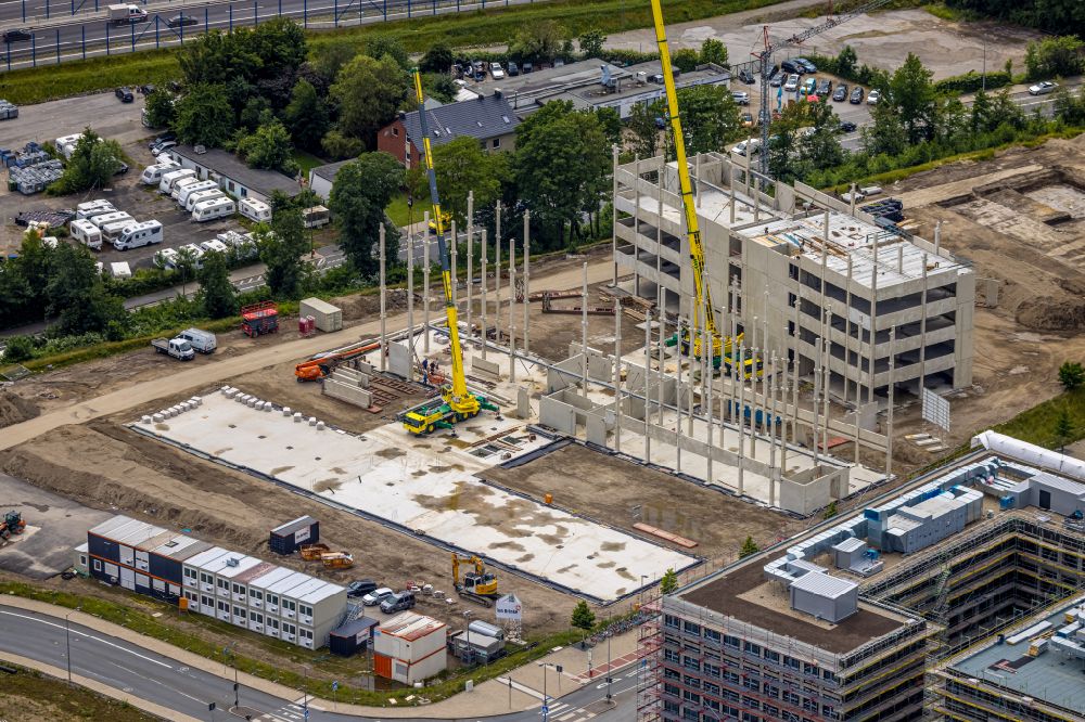 Bochum from the bird's eye view: Construction site for the new building of an Office building - Ensemble O-Werk- Campus on street Suttner-Nobel-Allee in Bochum at Ruhrgebiet in the state North Rhine-Westphalia, Germany