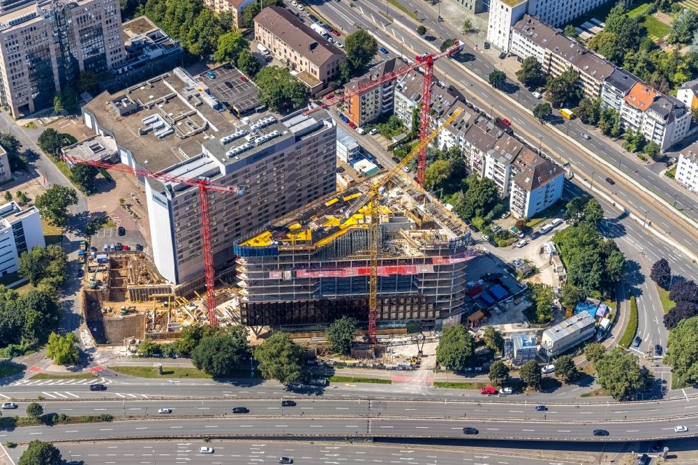 Düsseldorf from the bird's eye view: Construction site to build a new office and commercial building Eclipse at the Kennedydamm in Duesseldorf at Ruhrgebiet in the state North Rhine-Westphalia, Germany