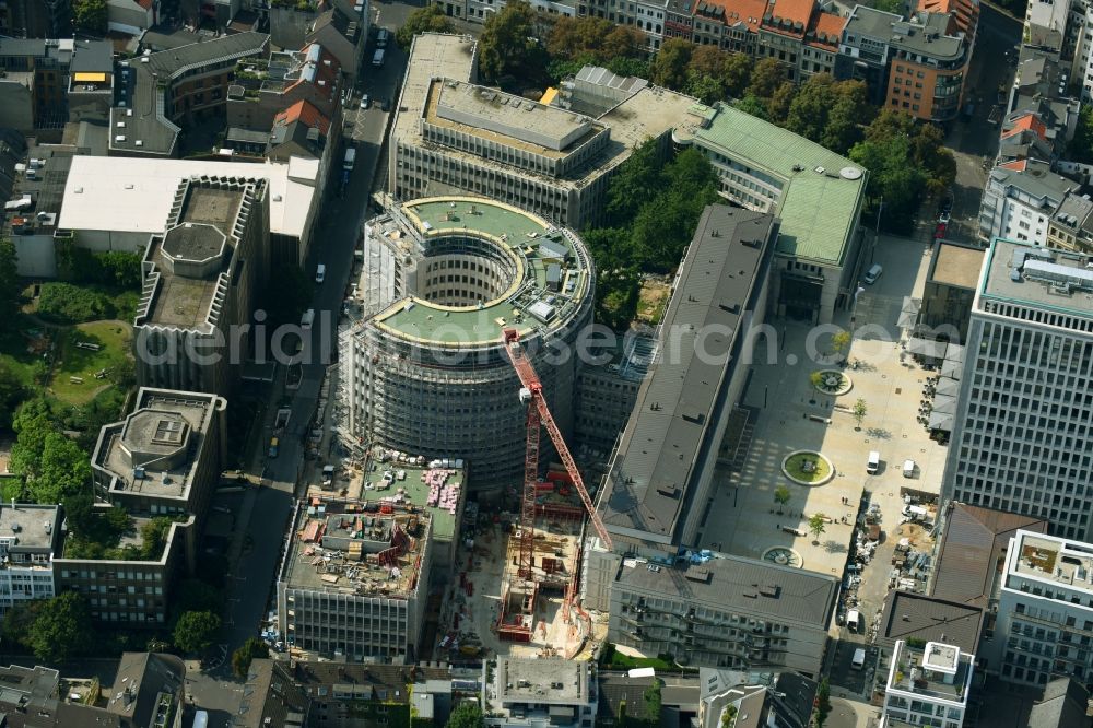 Köln from above - Construction site to build a new office and commercial building to the Revitalization and restoration monument - office buildings rotunda GQ1 and GQ23 Im Klapperhof in Cologne in the state North Rhine-Westphalia, Germany