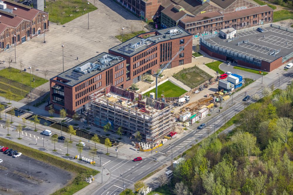 Dortmund from above - Construction site for a new office building on Konrad-Zuse-Strasse - Hochofenstrasse in the district of Hoerde in Dortmund in the Ruhr area in the state of North Rhine-Westphalia, Germany
