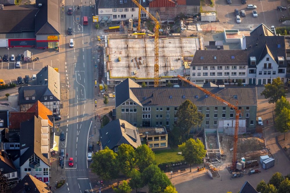 Aerial photograph Warstein - Construction site for the new building of cathedral square at Dieplohstrasse / corner B55 in Warstein in the state North Rhine-Westphalia, Germany