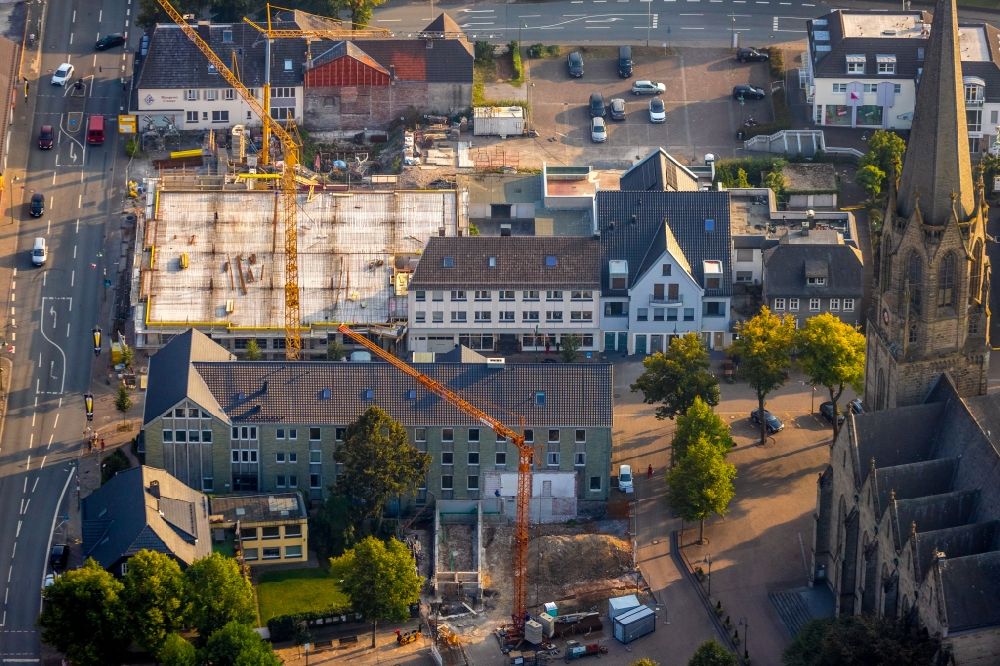 Warstein from above - Construction site for the new building of cathedral square at Dieplohstrasse / corner B55 in Warstein in the state North Rhine-Westphalia, Germany
