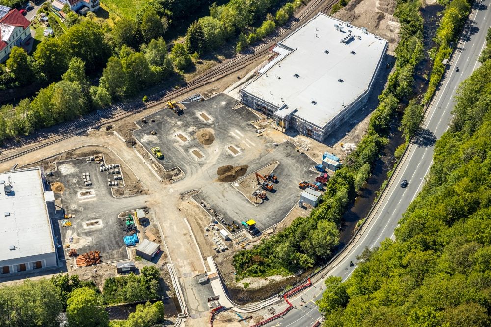 Aerial photograph Lüdenscheid - Construction site for the construction of an Edeka - supermarket and a Trinkgut - beverage market along the Volmestrasse in the district Bruegge in Luedenscheid in the state North Rhine-Westphalia, Germany