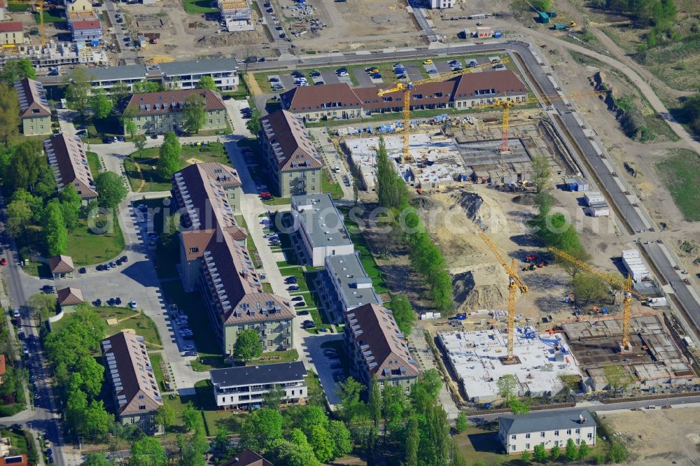 Aerial photograph Berlin - Construction site for a residential area in Karlshorst in the Lichtenberg district of Berlin in Germany. The development of InCasa project with semi-detached houses and residential areas is located on site of the historic military base in Karlshorst