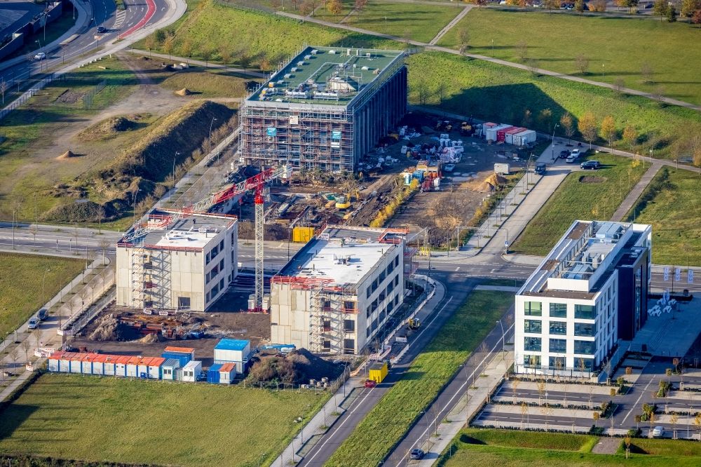 Aerial image Dortmund - Construction site for the new building of a research building and office complex of DAIKIN Chemical Europe GmbH overlooking the Phoenix-Arcaden and the TMM Forum on Carlo-Schmid-Allee - Walter-Bruch-Strasse - Antonio-Segni-Strasse in the district Phoenix-West in Dortmund in the state North Rhine-Westphalia, Germany