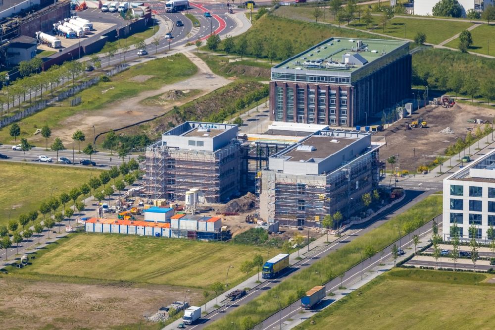 Aerial image Dortmund - Construction site for the new building of a research building and office complex of DAIKIN Chemical Europe GmbH overlooking the TMM Forum on Carlo-Schmid-Allee - Walter-Bruch-Strasse - Antonio-Segni-Strasse in the district Phoenix-West in Dortmund in the state North Rhine-Westphalia, Germany