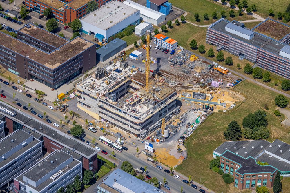 Dortmund from the bird's eye view: Construction site for the new building of a research building and office complex of the Forsschungszentrum CALEDO in the Dortmund Technology Park on Otto-Hahn-Strasse in the district Barop in Dortmund at Ruhrgebiet in the state North Rhine-Westphalia, Germany