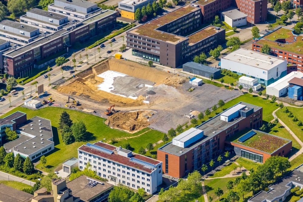 Dortmund from the bird's eye view: Construction site for the new building of a research building and office complex of the ForA?schungsA?zenA?trum CALEDO in the Dortmund Technology Park on Otto-Hahn-Strasse in the district Barop in Dortmund at Ruhrgebiet in the state North Rhine-Westphalia, Germany