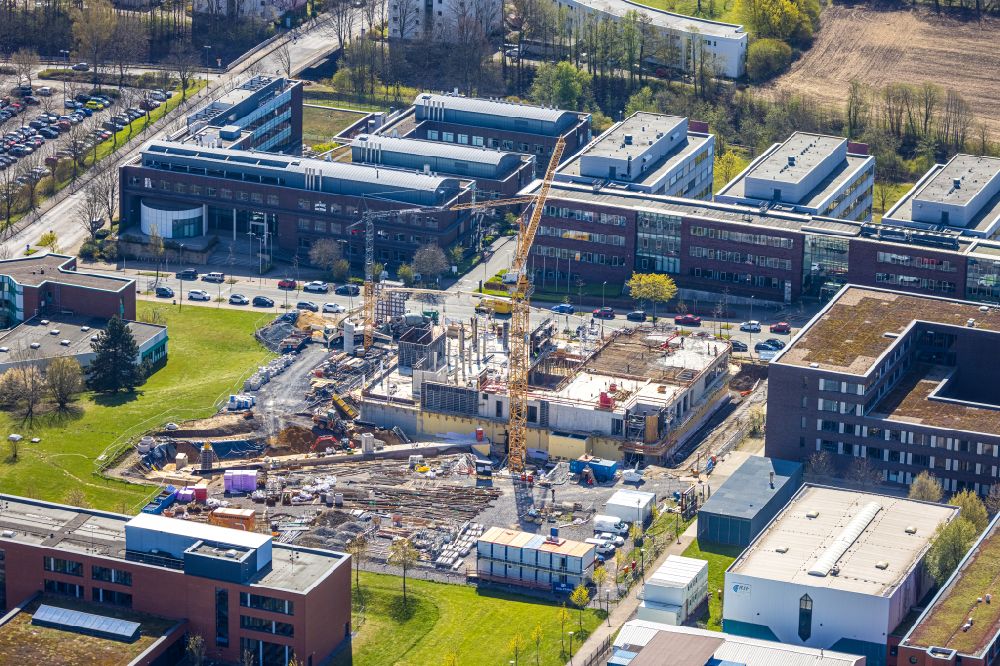 Dortmund from above - Construction site for the new building of a research building and office complex of the ForA?schungsA?zenA?trum CALEDO in the Dortmund Technology Park on Otto-Hahn-Strasse in the district Barop in Dortmund at Ruhrgebiet in the state North Rhine-Westphalia, Germany