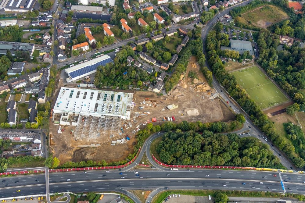 Bochum from the bird's eye view: Construction site for new construction building of the construction market on Berliner Strasse in the district Wattenscheid in Bochum in the state North Rhine-Westphalia, Germany