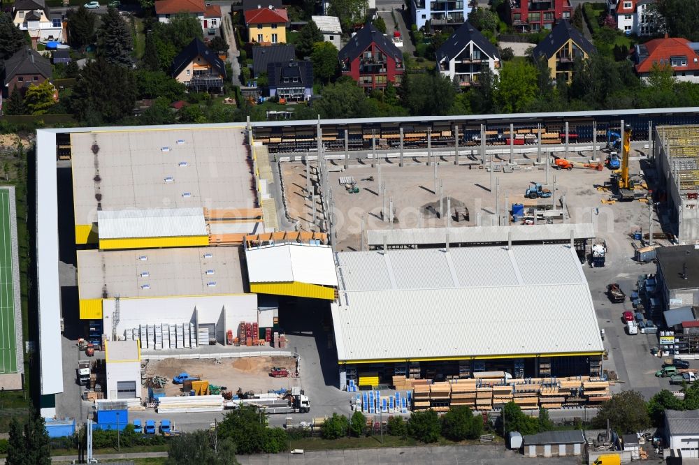Aerial photograph Berlin - Construction site for new construction building of the construction market on Landsberger Strasse in the district Mahlsdorf in Berlin, Germany