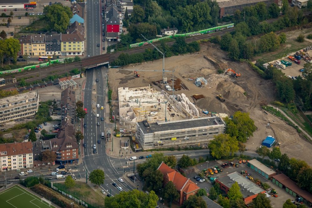 Essen from the bird's eye view: New construction of the building complex of the shopping center Altenessen-Sued-Karree on Altenessener Strasse in Essen in the state North Rhine-Westphalia, Germany