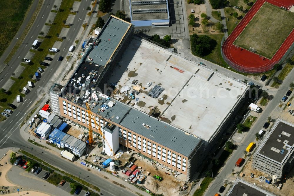 Aerial photograph Schönefeld - New construction of the building complex of the shopping centeron Hans-Grade-Allee corner Rudower Chaussee in Schoenefeld in the state Brandenburg, Germany