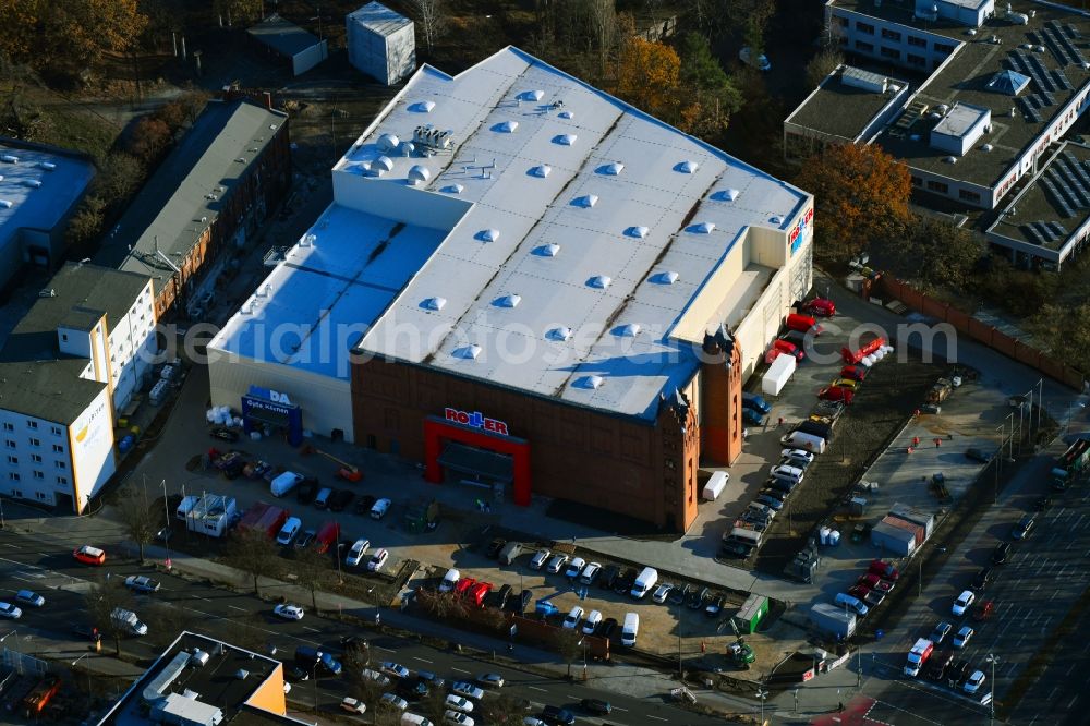 Aerial image Berlin - New construction of the building complex of the shopping center in ehemaligen Fabrikgebaeude of formerly GDR Baerensiegel on Adlergestell corner Glienicker Weg in the district Adlershof in Berlin, Germany