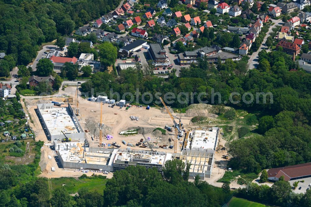 Hansestadt Wismar from the bird's eye view: New construction of the building complex of the shopping center on street Schweriner Strasse in Hansestadt Wismar at the baltic sea coast in the state Mecklenburg - Western Pomerania, Germany