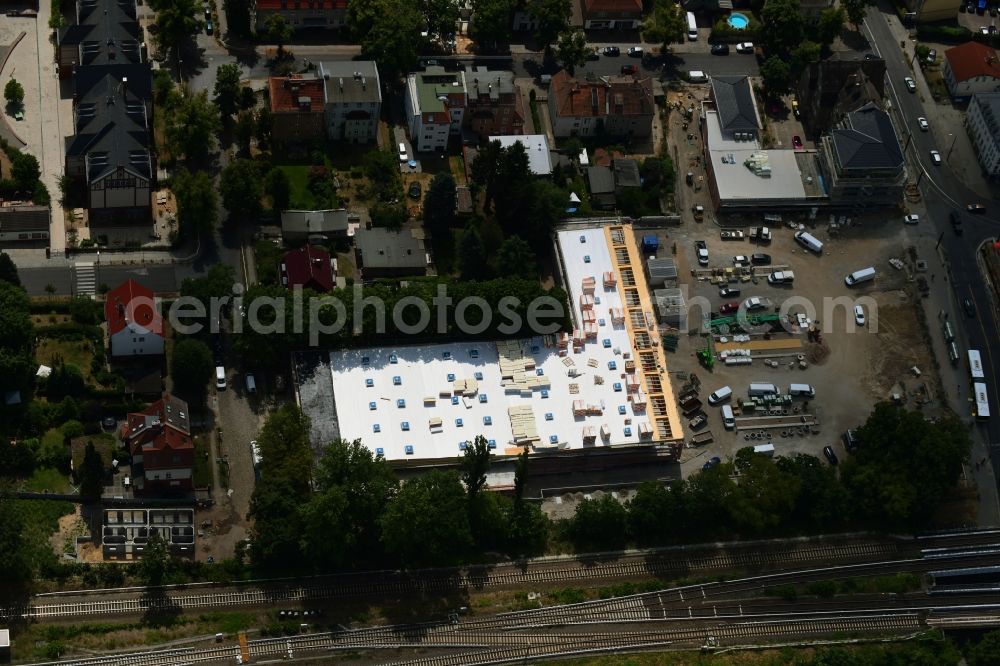 Aerial image Berlin - New construction of the building complex of the shopping center on Hoenower Strasse in the district Mahlsdorf in Berlin, Germany