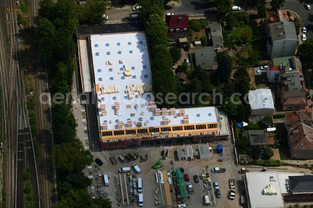 Aerial image Berlin - New construction of the building complex of the shopping center on Hoenower Strasse in the district Mahlsdorf in Berlin, Germany