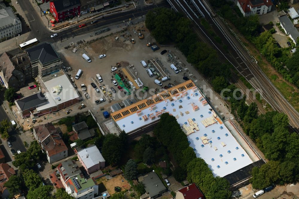 Berlin from the bird's eye view: New construction of the building complex of the shopping center on Hoenower Strasse in the district Mahlsdorf in Berlin, Germany
