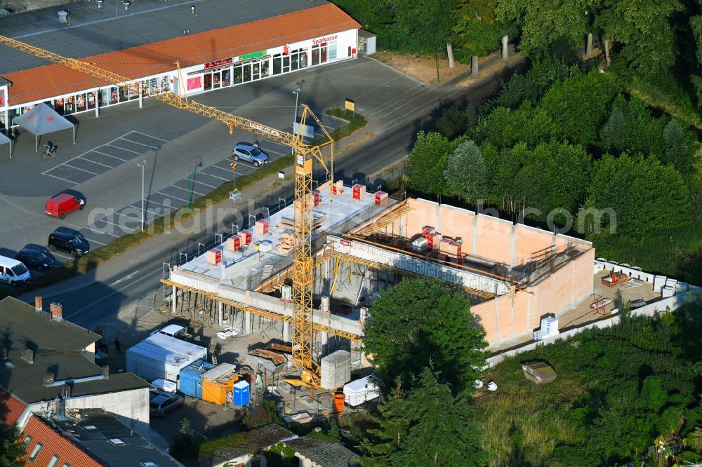 Aerial image Werneuchen - New construction of the building complex of the shopping center einer Rossmann-Filiale on Schulstrasse in Werneuchen in the state Brandenburg, Germany