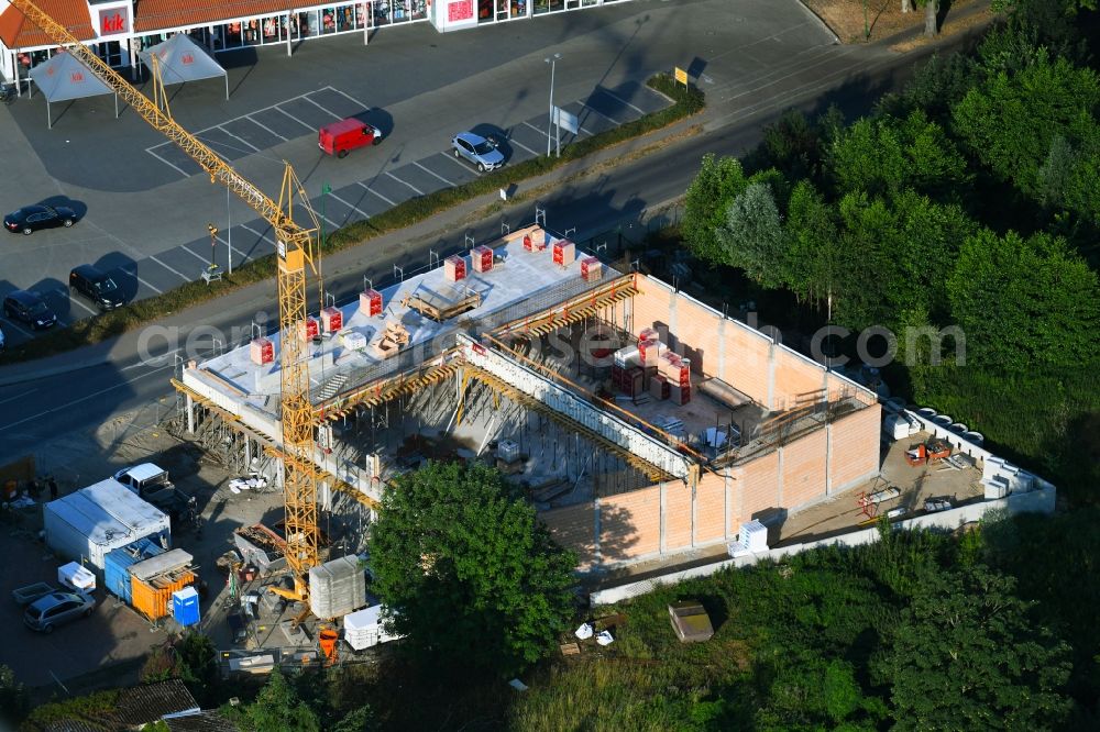 Werneuchen from above - New construction of the building complex of the shopping center einer Rossmann-Filiale on Schulstrasse in Werneuchen in the state Brandenburg, Germany