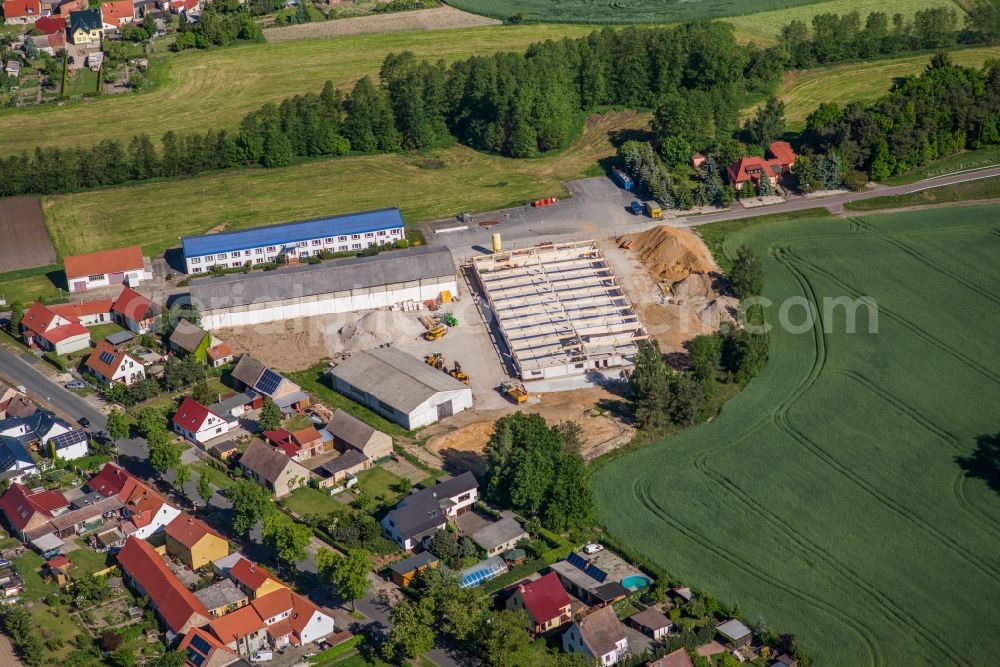 Planetal from the bird's eye view: New construction of the building complex of the shopping center Thomas Philipps GmbH & Co. KG in the district Dahnsdorf in Planetal in the state Brandenburg, Germany