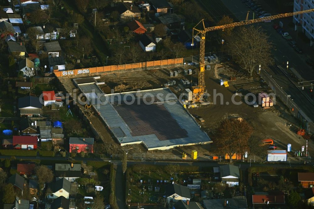 Aerial photograph Berlin - New construction of the building complex of the shopping center Wartenberger Strasse corner Anna-Ebermonn-Strasse in the district Hohenschoenhausen in Berlin, Germany