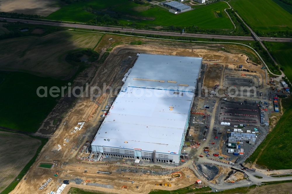 Dummerstorf from the bird's eye view: Construction site to build a new building complex on the site of the logistics center Amazon in Dummerstorf in the state Mecklenburg - Western Pomerania, Germany